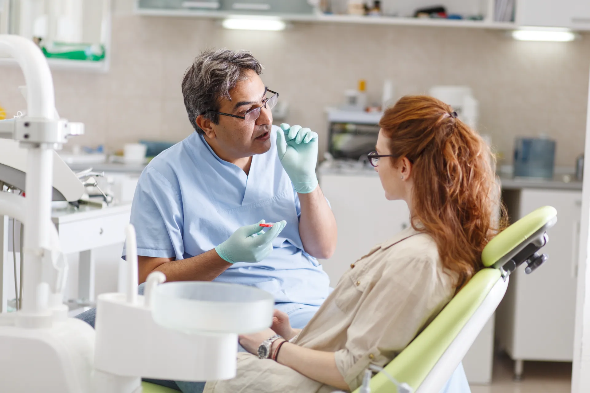 Dentist discussing sedation and comfort options with a patient in the Anaheim Smile Center office